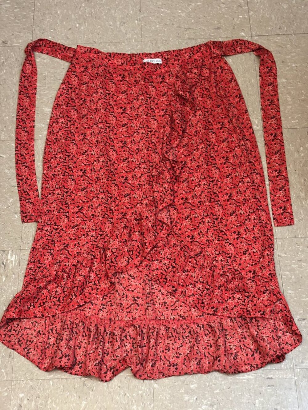 Gallery ruffled floral satin midi wrap skirt.